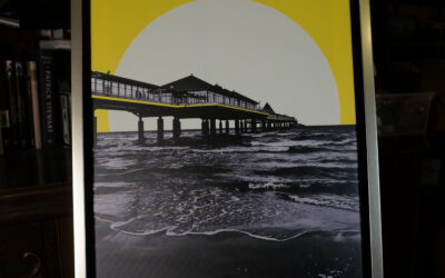 Ein neues Kapitel der Fotografik – Mein Leinwanddruck der Seebrücke Heringsdorf auf Usedom im altsilbernen Schattenfugenrahmen